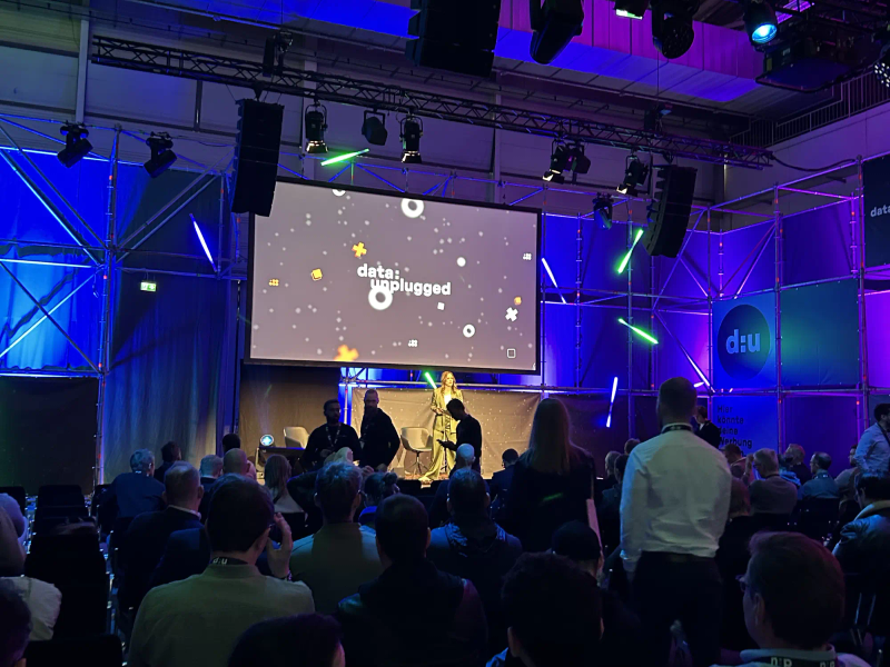 The photo shows the stage at data:unplugged 2026.