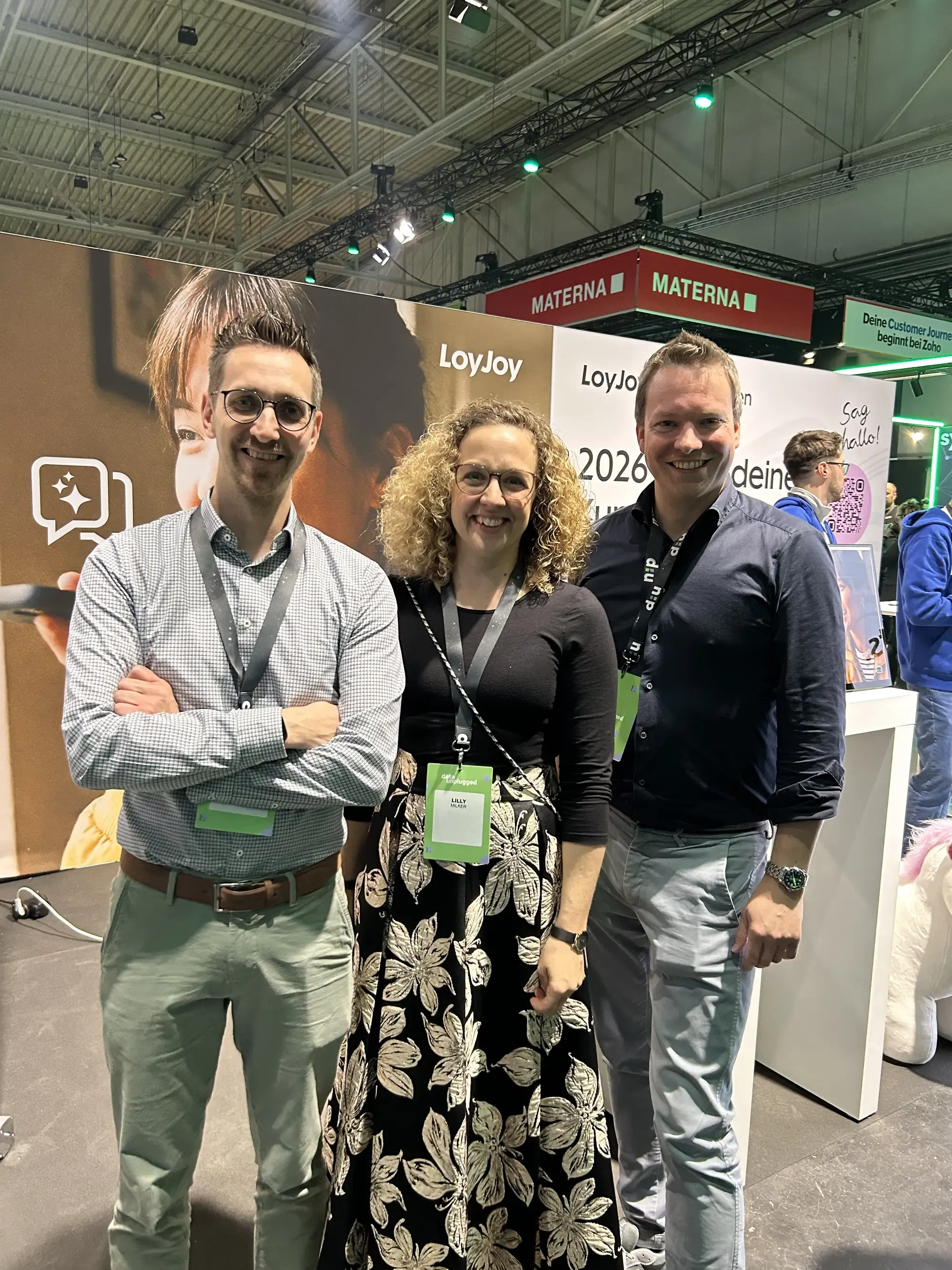 A group photo of Ulf Loetschert, Lilly Milker, and Tim Ebermann after their presentation.