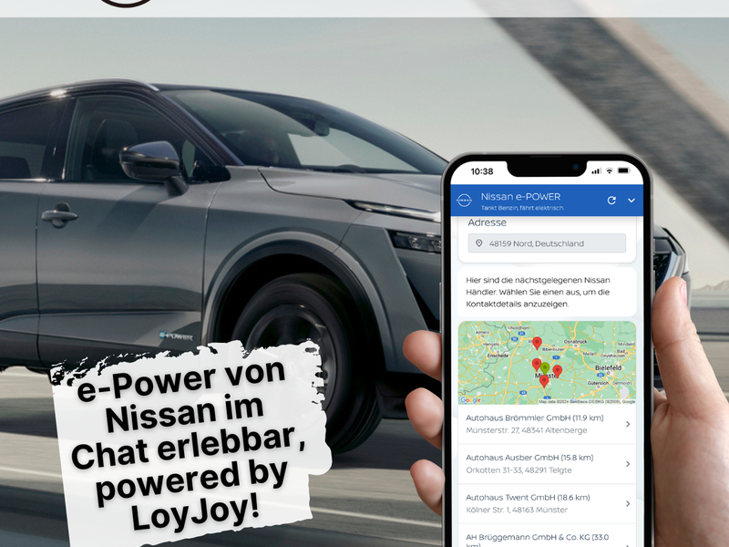 You can see a grey Nissan. Next to it is a mobile phone showing the e-POWER chatbot in more detail. A conversation between the chatbot and a user can be seen. The user is shown the nearest Nissan dealerships.