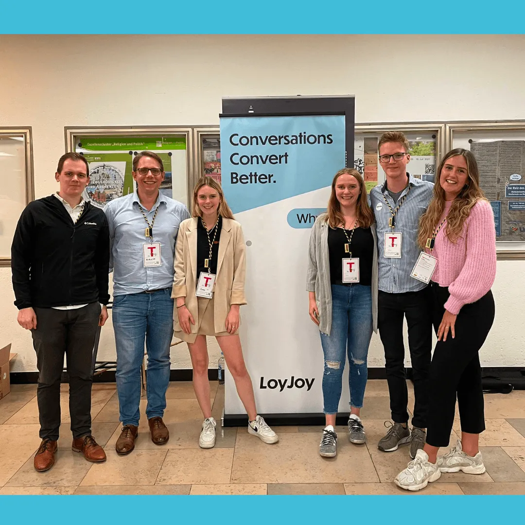 The LoyJoy team standing in front of a LoyJoy display.