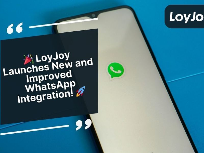 Smartphone with LoyJoy announcement for new WhatsApp integration.